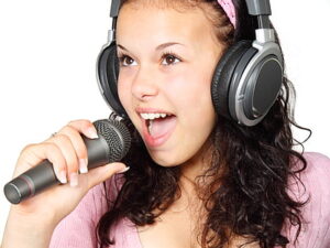 girl-holding-karaoke-mic-thumb